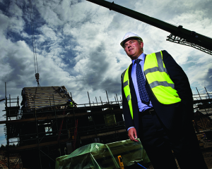 MP Brandon Lewis  Housing and planning minister for the UK government pictured in front of a new housing development.. Image shot 2014. Exact date unknown.