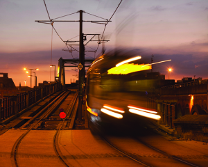 Metrolink tram passes Manchester conference centre, Manchester Central GMex