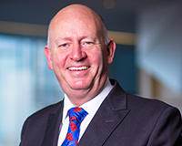 Darkins to retire from TH Real Estate