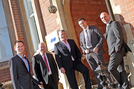Alan Pearson, left, and Rob Spencer, second right, with FHP directors Andrew Chapman (second left), David Hargreaves (centre), and John Proctor (right)