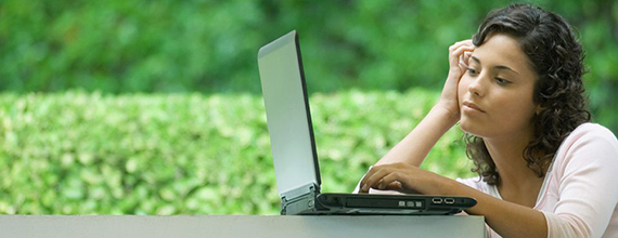 Woman-working-on-computer-outdoors-960x370