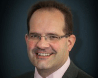 Warrack promoted at Johnson Fellows