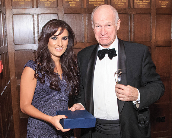 Outgoing PLA president Lord Neuberger presents the award to Erina Kourtis. Picture courtesy of Gerald Sharp Photography.