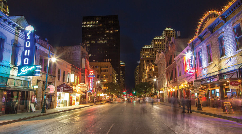 E3P9BM Sixth Street at dusk in downtown Austin, Texas, USA