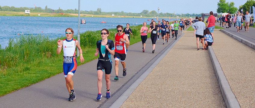 Triathletes make tracks in blazing sunshine